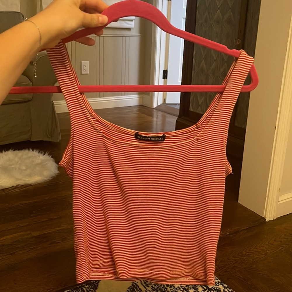 A staple piece in your closet. A cute red and white stripped tank.